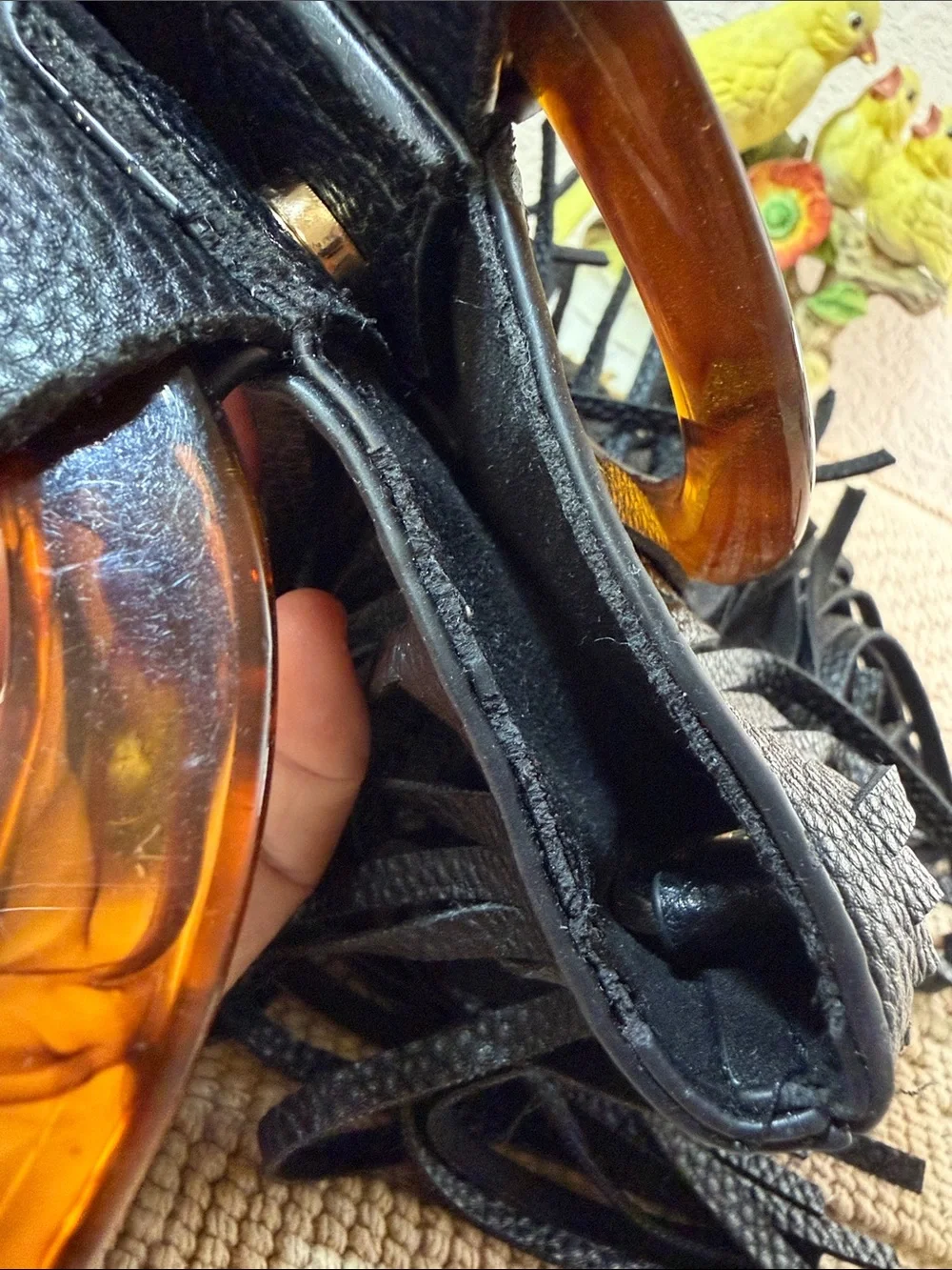 Black Fringed Wristlet with Amber Acrylic Ring Handle
